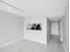 Dining area with kitchen pass-through and view to entryway at 2424 W Tampa Bay Blvd # L-302, Tampa, FL 33607