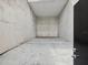 Empty storage room with concrete floor and walls at 2424 W Tampa Bay Blvd # L-302, Tampa, FL 33607