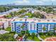 Aerial view of condo building with surrounding landscape and water at 2424 W Tampa Bay Blvd # L-302, Tampa, FL 33607