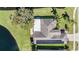 Aerial view of house with solar panels at 1533 Westerham Loop, Trinity, FL 34655