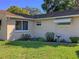 House exterior showcasing well-maintained lawn and landscaping at 3439 Cockatoo Dr, Holiday, FL 34690