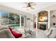 Bright living area with comfortable seating and fireplace at 41 Cypress Dr, Palm Harbor, FL 34684