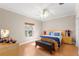 Bright bedroom with wood floors and modern furnishings at 41 Cypress Dr, Palm Harbor, FL 34684