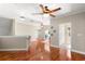 Spacious landing with hardwood floors and access to bedrooms at 41 Cypress Dr, Palm Harbor, FL 34684