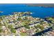 Aerial view showcasing home's waterfront location and community at 41 Cypress Dr, Palm Harbor, FL 34684