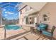 Relaxing pool area with covered patio and seating at 41 Cypress Dr, Palm Harbor, FL 34684