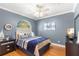 Bedroom with nautical theme and wood floors at 41 Cypress Dr, Palm Harbor, FL 34684