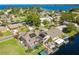 Aerial view showcasing home, pool, and dock at 41 Cypress Dr, Palm Harbor, FL 34684