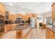 Spacious kitchen featuring granite countertops and ample cabinetry at 41 Cypress Dr, Palm Harbor, FL 34684