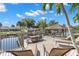 Private dock with seating and water views at 41 Cypress Dr, Palm Harbor, FL 34684