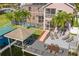 Aerial view of home with pool and dock at 41 Cypress Dr, Palm Harbor, FL 34684