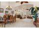 Elegant dining room with a large wooden table and charming decor at 9312 Gentle Ben Ct, Weeki Wachee, FL 34613