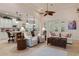 Open living room with kitchen views and comfortable seating at 9312 Gentle Ben Ct, Weeki Wachee, FL 34613