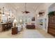 Open living room with kitchen views and comfortable seating at 9312 Gentle Ben Ct, Weeki Wachee, FL 34613
