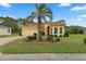 Single-Gathering home with brick driveway and palm tree at 9312 Gentle Ben Ct, Weeki Wachee, FL 34613