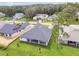 Aerial view showcasing new homes under construction and completed homes at 19395 Sheltered Hill Dr, Brooksville, FL 34601