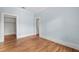 Bedroom with hardwood floors, light walls and closet at 321 S Brooksville Ave, Brooksville, FL 34601