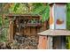 Rustic shed with various tools and a boombox at 14335 Snow Memorial Hwy, Brooksville, FL 34601