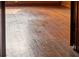 Image of worn hardwood floor in need of refinishing at 14335 Snow Memorial Hwy, Brooksville, FL 34601