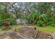 Large backyard with shed and wooden deck at 14335 Snow Memorial Hwy, Brooksville, FL 34601