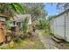 Pathway through backyard leading to shed and home at 14335 Snow Memorial Hwy, Brooksville, FL 34601