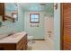 Bathroom with vintage vanity and bathtub at 14335 Snow Memorial Hwy, Brooksville, FL 34601