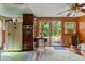 Retro kitchen features vintage appliances and access to a backyard patio at 14335 Snow Memorial Hwy, Brooksville, FL 34601
