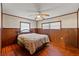 Bedroom with wood flooring and ceiling fan at 14335 Snow Memorial Hwy, Brooksville, FL 34601