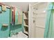 View of a small bathroom with a shower and vintage sink at 14335 Snow Memorial Hwy, Brooksville, FL 34601