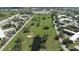 Aerial perspective of community near green space at 2402 Ecuadorian Way # 22, Clearwater, FL 33763