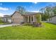 Lovely single-story home with a two-car garage, tidy landscaping, and a neutral color palette at 11512 Weaver Hollow Rd, New Port Richey, FL 34654
