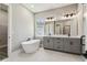 Modern bathroom featuring a soaking tub, double vanity, and sleek fixtures at 6109 Dusk Rose Ln, Brooksville, FL 34601