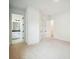 Neutral bedroom featuring an ensuite bathroom and walk-in closet at 6109 Dusk Rose Ln, Brooksville, FL 34601