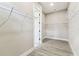 Spacious walk-in closet with wire shelving and neutral paint at 6109 Dusk Rose Ln, Brooksville, FL 34601