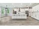 Bright kitchen with a large island and stainless steel appliances at 6109 Dusk Rose Ln, Brooksville, FL 34601