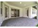 Covered patio space featuring brick pavers, offering an inviting outdoor area at 6109 Dusk Rose Ln, Brooksville, FL 34601