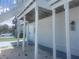 Exterior view of property with access to under-house parking and storage at 6428 Driftwood Dr, Hudson, FL 34667