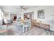 Dining area with open floor plan and view into living room at 11214 Elderberry Dr, Port Richey, FL 34668