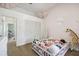 bedroom with toddler bed and ample closet space at 9142 Brooker Dr, New Port Richey, FL 34655
