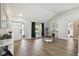 Living room featuring hardwood floors and an entryway view at 9142 Brooker Dr, New Port Richey, FL 34655