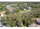 An aerial view of the property and surrounding homes at 9142 Brooker Dr, New Port Richey, FL 34655