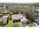 Aerial view of single-Gathering home with fenced backyard at 9142 Brooker Dr, New Port Richey, FL 34655