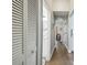 Bright hallway with wood floors and access to other rooms at 9142 Brooker Dr, New Port Richey, FL 34655