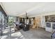 Relaxing screened porch with seating and play area at 9142 Brooker Dr, New Port Richey, FL 34655