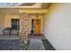 Inviting front entrance with a yellow door and stone accents at 9142 Brooker Dr, New Port Richey, FL 34655