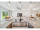 Kitchen island with stainless steel sink and breakfast bar seating at 12125 Finch Rd, Weeki Wachee, FL 34614