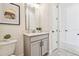 Guest bathroom with vanity and toilet at 11313 Limpkin Rd, Weeki Wachee, FL 34614