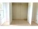 Large walk-in closet with double doors and ample shelving at 11200 86Th Ave # 204, Seminole, FL 33772