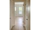 Hallway with tile floors and access to bedrooms and other rooms at 11200 86Th Ave # 204, Seminole, FL 33772