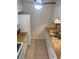 Full kitchen with white cabinets and appliances at 11200 86Th Ave # 204, Seminole, FL 33772